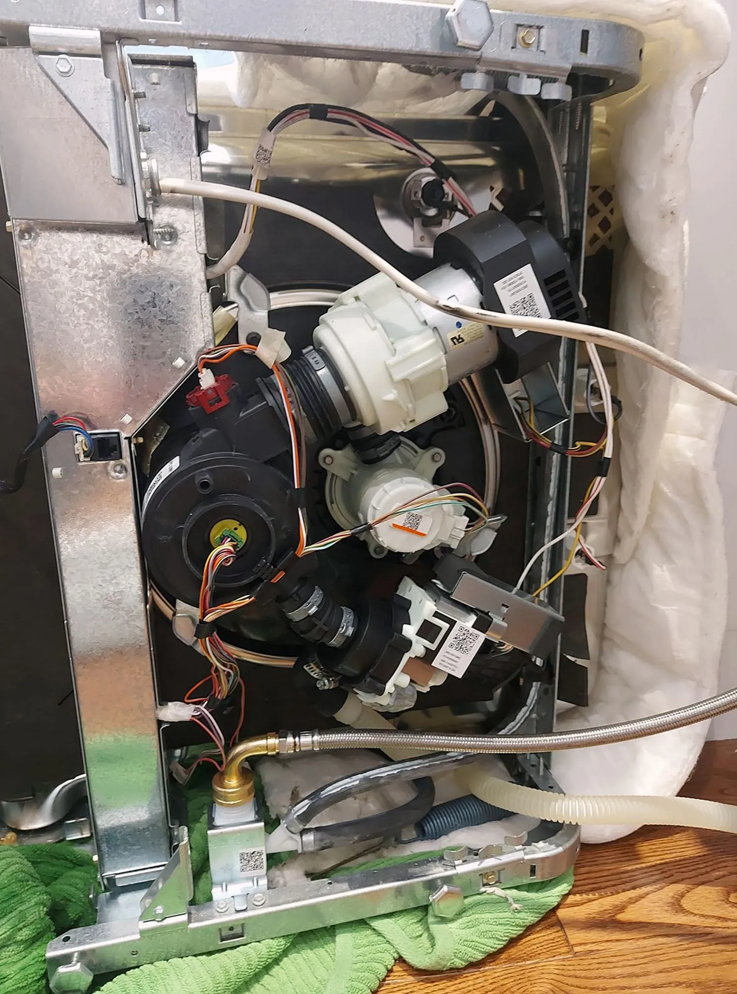 Dishwasher pump and wiring opened up during appliance repair in Dallas